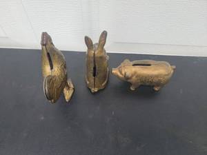 lot 67 image: Charming Primitive Brass Coin Banks