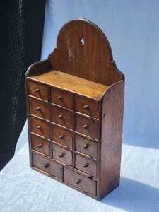 lot 145 image: Antique 14 Drawer Wall Mount Spice Cabinet