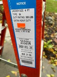 lot 203 image: Green Bull Four Foot Fiberglass Step Ladder Model 203204