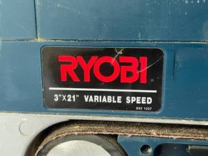 lot 253 image: Ryobi 3 x 21 Inch Variable Speed Belt Sander Model BE321
