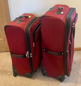 lot 60 image: Two London Fog Travel Rolling Suitcases  Luggage