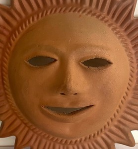 lot 28 image: Terra Cotta Sunshine Face Decor
