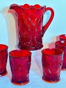 lot 17 image: Vintage Ruby Red Mosser Inverted Thistle Pitcher and Tumblers