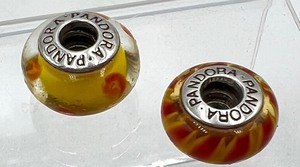 lot 35A image: Two Pandora Art Glass and Sterling Beads