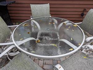 lot 149 image: Glass Topped Patio Table and Chairs