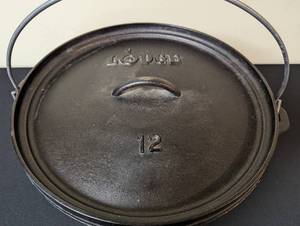 lot 272 image: Lodge 12 Cast Iron Dutch Camping Oven