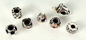 lot 429 image: (7) Pandora Sterling Silver Charms