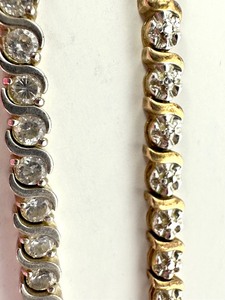 lot 422 image: Two Sparkling Sterling Silver Bracelets