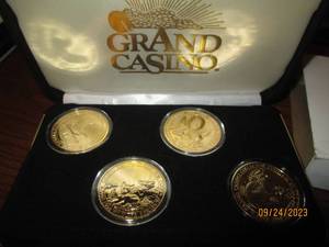 lot 53 image: 1-Grand Casino collector coin set i...