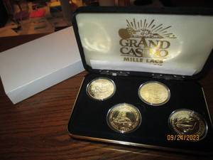 lot 54 image: 1-Grand Casino collector coin set i...