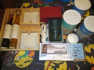 lot 150 image: New in package oils and dipping pla...