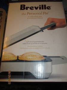 lot 153 image: Breville 4-place personal pie maker...