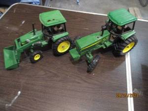 lot 201 image: Pair of 116 scale John Deere die c...