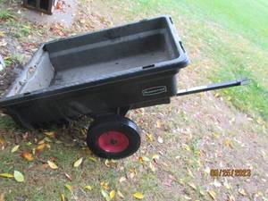 lot 254 image: Rubbermaid tow-behind yard cart...