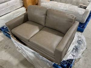 lot 46 image: Macys Leather Taupe Loveseat