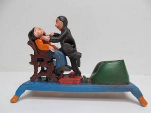lot 65 image: Antique Style Cast Iron Mechanical Coin Bank - Dentist Pulling Tooth