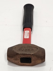 lot 235 image: Unused PROTO Solid Brass Hammer 