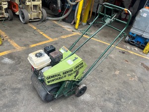 lot 8 image: Turf aerator Honda engine