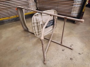 lot 10A image: 50 Bone folding chairs.