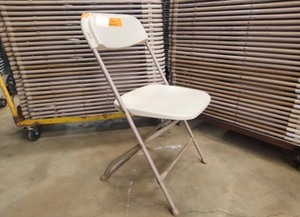 lot 40 image: 50 Bone folding chairs