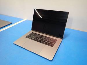 lot 41 image: Apple&nbspMacBookPro15,1 A1990 MR932LLA &nbspINTEL(R) CORE(TM) I7-8750H CPU  2.20GHZ  16GB LPDDR4 RAM  251GB SSD  15 screen with 3360 x 2100 2K resolution  Includes IOS  No charger