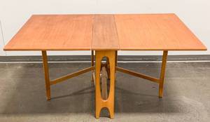 lot 49 image: 1960s Danish Modern Drop-Leaf Teak Table by Bendt Winged for Kleppes Mobelfabrikk