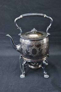 lot 86 image: Electro Plated Silver Tilting Teapot with Stand Burner