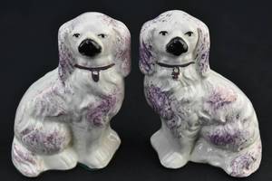 lot 268 image: Pair of White and Purple Staffordshire Dog Figurines