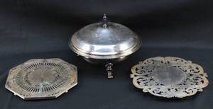 lot 173 image: Lord & Taylor Silver Plate Covered Serving Plate and 2 Silver Plate Trivets