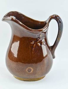 lot 305 image: Brown Glazed Stoneware Pitcher