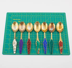 lot 16 image: 7 Worcester Silver Co. Sterling Christmas Spoons
