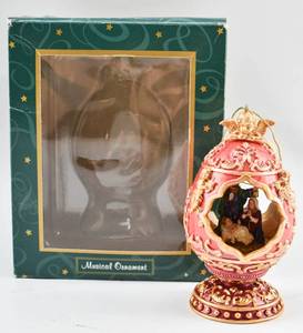 lot 169 image: Michael Adams San Francisco Music Box Company Musical Nativity Ornament