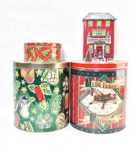 lot 144 image: Four Holiday Themed Metal Tins