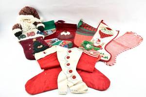 lot 199 image: Nine Assorted Christmas Stockings, Variety of Shapes and Sizes