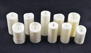 lot 212 image: Group of 10 Off-White Moving Flames Flameless Candles, Assorted Brands