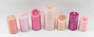 lot 250 image: 7 Pink Toned Moving Flame Flameless Pillar Candles, Mostly Luminara
