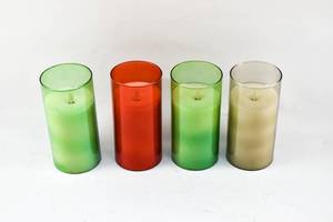 lot 254 image: 4 White Moving Flame Flameless Pillar Candles in Glass Votives