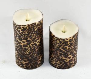 lot 257 image: 2 Leopard Print Luminara Moving Flame Flameless Pillar Candles