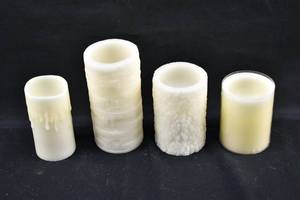 lot 275 image: 4 Ivory Flameless Pillar Candles, Various Brands
