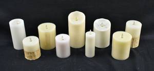 lot 276 image: 9 White, Off-White, & Light Pink Moving Flame Flameless Pillar Candles