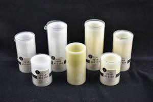 lot 280 image: 7 Ivory & White Flameless Pillar Candles