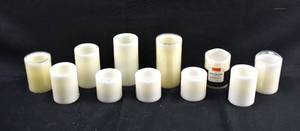 lot 281 image: 11 White & Off-White Flameless Pillar Candles