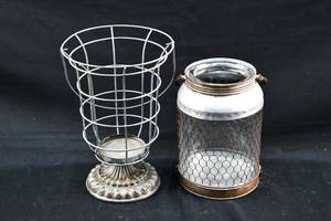 lot 297 image: 2 Large Grey Rustic Metal Candle Holders