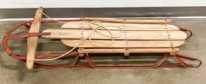 lot 31 image: Vintage Wood and Red Metal Runner Sled
