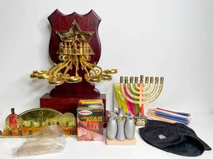 lot 305 image: Box of Four Menorahs, Chanukah Candles, and Yarmulkes