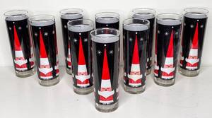 lot 14 image: 10 Vintage Libbey Holt Howard Santa Glasses