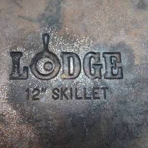 lot 32 image: LODGE CAST IRON PAN 12 USA USA DI 10SK