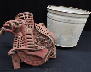 lot 37 image: ANTIQUE CAST IRON CORN SHUCKER AND BUCKET