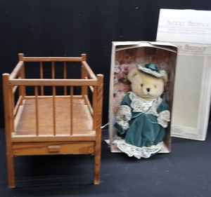 lot 64 image: ANTIQUE DOLL CRIB AND HERITAGE JOINTED TEDDY BEAR