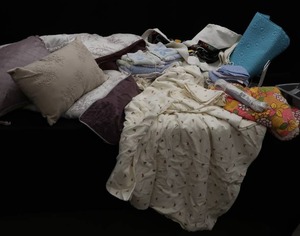 lot 24 image: LOT OF TOWELS AND FLANNEL SHEETS AND A LARGE QUILT